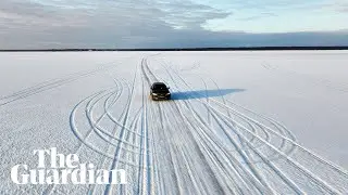 Drone video shows 'ice road' across frozen sea