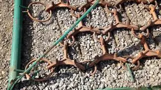 Using spike harrow as a land leveller