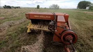 2019 First Hay Cutting - raking and baling with New Holland 283 and 8-pack Accumulator