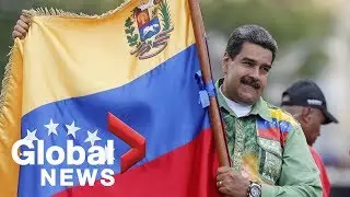 Venezuela crisis: Thousands of Nicol&aacute;s Maduro supporters march through Caracas