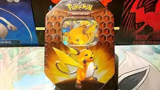 Opening a Pokemon Hidden Fates Raichu Tin