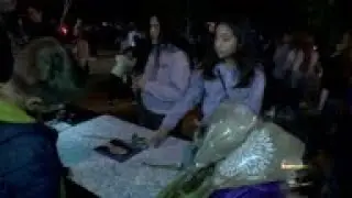 Thousands at vigil for victims of California school shooting