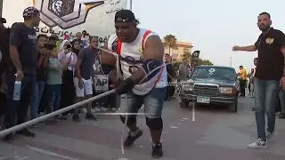 Egyptian wrestler attempts to break Guinness World record for most number of cars pulled by an indiv