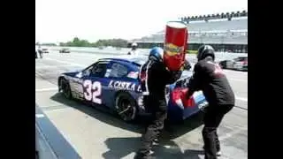 Watching the car race from the pit stop... Exhilarating!
