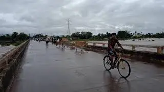 Manamunda tel river flood scene via bridge