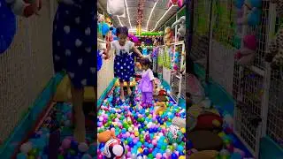 Climb the yellow slide and jump into the colorful ball pool doll and ball house rides very exciting