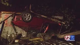Woman seriously injured after crash into junkyard