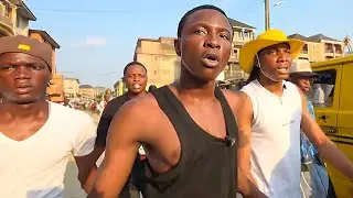 Ojo Takes Enzo To The Biggest Market Place In Lagos..