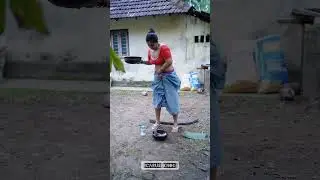 Mallu Model Cutting and Cleaning Fish in Old Traditional Outfit
