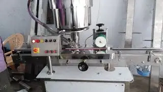 AUTOMATIC MEASURING CUP PLACEMENT MACHINE