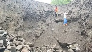The miners were happy, the process of searching for black sand was carried out by two miners