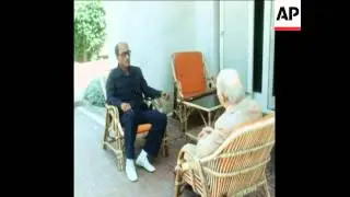 SYND 17 9 76 EGYPT'S PRESIDENT SADAT AND LEBANESE PRESIDENT SALAM TALKING IN MIT ABUL-KOM.