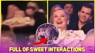 Luke Newton gentlemanly helps Nicola Coughlan to sit down, full of Polin's interaction at the BAFTAs