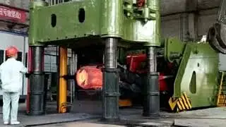 1600 ton hydraulic press and 10 ton manipulator drawing shaft forging video