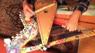 Clandestino, on Harpolin. (Half bow d Psaltery half harp)