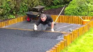 Wet pour rubber playground base installation