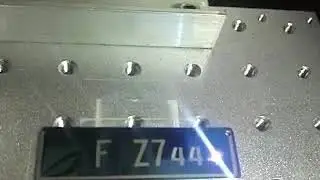 Portable laser marker for number plate marking