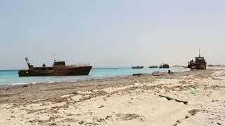 Libya coastguard battle to save migrants with single boat