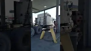 Trucker filling up both fuel tank. 👍