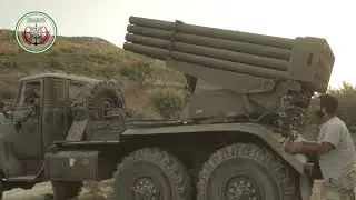 Fighters prepare and fire a barrage of 122mm rockets launcher, Syria