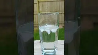 Ice cubes in hot water timelapse