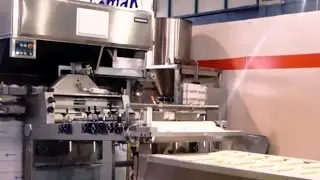ENKOMAK Автоматический укладчик тестовых заготовок от делителя до противня в тележке