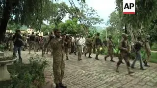 Pakistani anti-government protesters stormed the state TV building on Monday, forcing the channel br