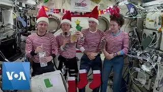 NASA Astronauts in Space Celebrate the Holidays with Smoked Salmon and Fruitcake