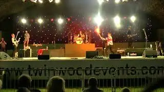 Jamie Goddard smashing his guitar with The Zoots