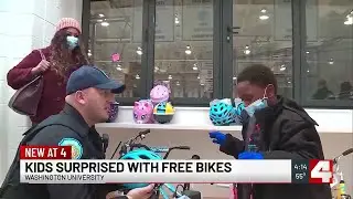 Wash U, SLMPD surprise kids with free bikes