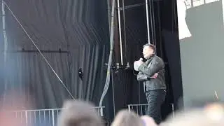 Elon Musk on stage at Gigafest at Gigafactory 4 Berlin talking about Germany