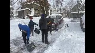 High school football team digs out community following winter storm