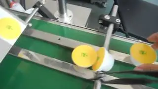 Little jelly cup stick labeling machine