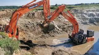 Вытаскиваем Хитачи 240 из песчаного карьера часть 1