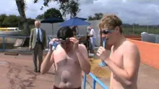 Lifeguards cleaning the pool