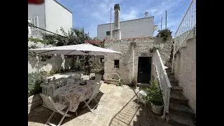 Abitazione in pietra con lamie e pignon con mansarda, cantina abitabile e giardino.