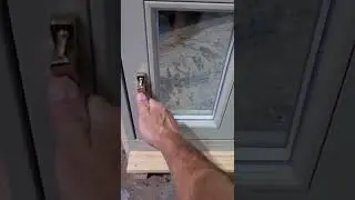 Inwards opening timber casement window.