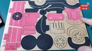 Old car. A toy construction kit made of wooden parts.