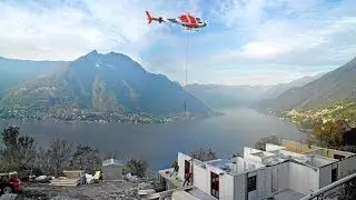 Wolf Haus costruisce una casa utilizzando l'elicottero