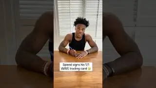 Speed signs his 1/1 WWE autograph card!! 🔥✍️