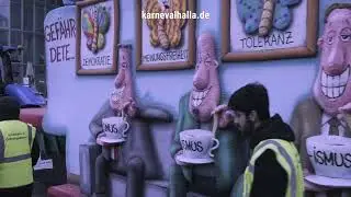 Karneval 2023 Rosenmontag D&uuml;sseldorf &ndash; Rosenmontagszug Mottowagen 2023 &ndash; Ismus