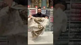 White suit with colourful multicolour work on suit silk material very heavy diamond work multicolo￼