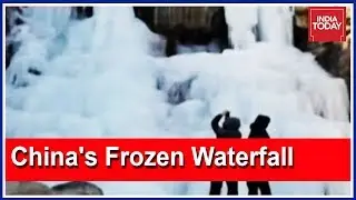 Stunning Visuals Of China's Frozen Waterfall On Mount Taishan