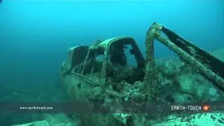 Divers explore sunken war plane