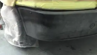 Verweerde kunstof bumper spuiten