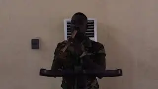 Ashanti Funeral Dirge for Atenteben by Military man. A soldier flutist