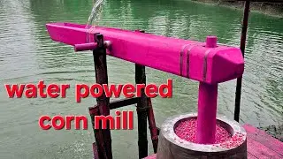 water powered corn pounder mill EP- 83