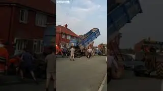 Фермер выбрасывает шины на подъездную дорожку к своему самосвалу || Dogtooth Media