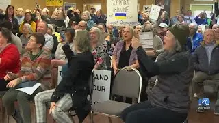Hundreds protest GOP, Trump agenda at Wittman event
