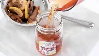 Straining a McKinnon's Dry Craft Cocktail